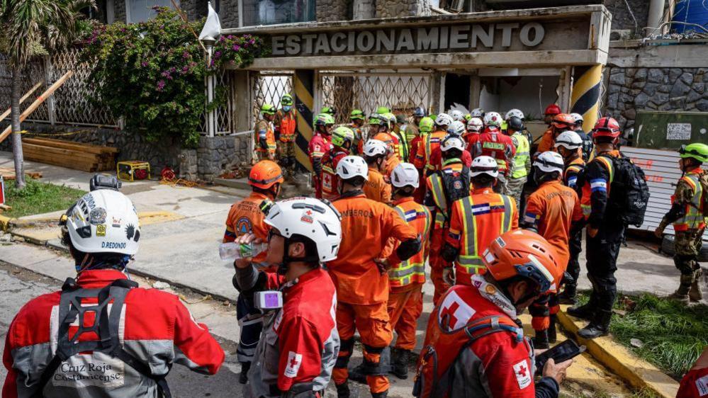 Venezuela quake survivor pulled out alive after eight days