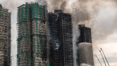 Fury Grows After Hong Kong's Deadly Blaze Claims 128 Lives
