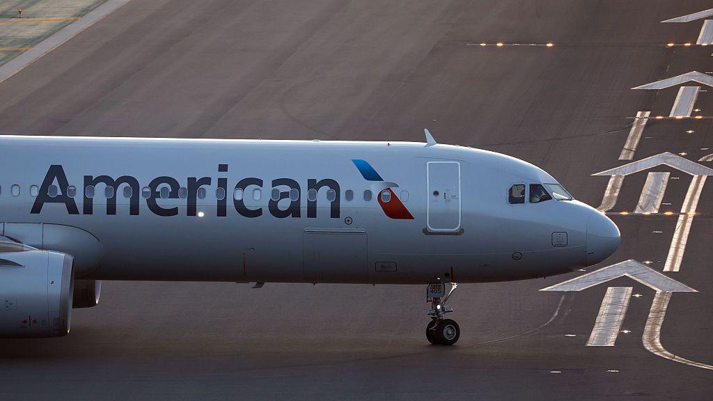 Laptop Fire on American Airlines Flight Leaves Passenger Hurt; Safety Concerns Mount