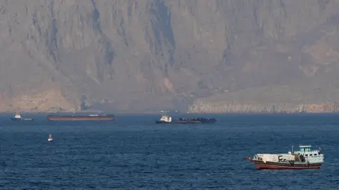 Tensions Escalate as Iran Closes Strait of Hormuz Amid Attacks on Shipping