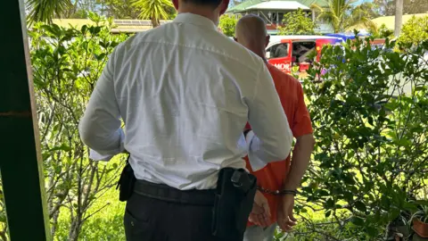 Australia to Deport British Man Charged with Promoting Nazi Symbols