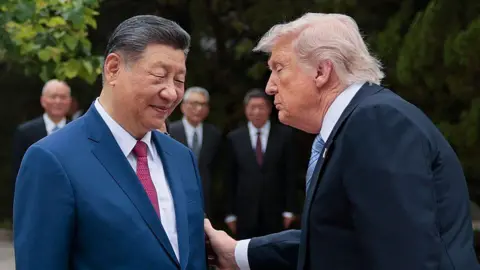 Trump's Beijing Visit: A Softening Tone Amid Tensions