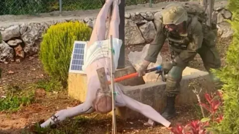 Shock and Outrage as Israeli Soldier Destroys Jesus Statue in Lebanon