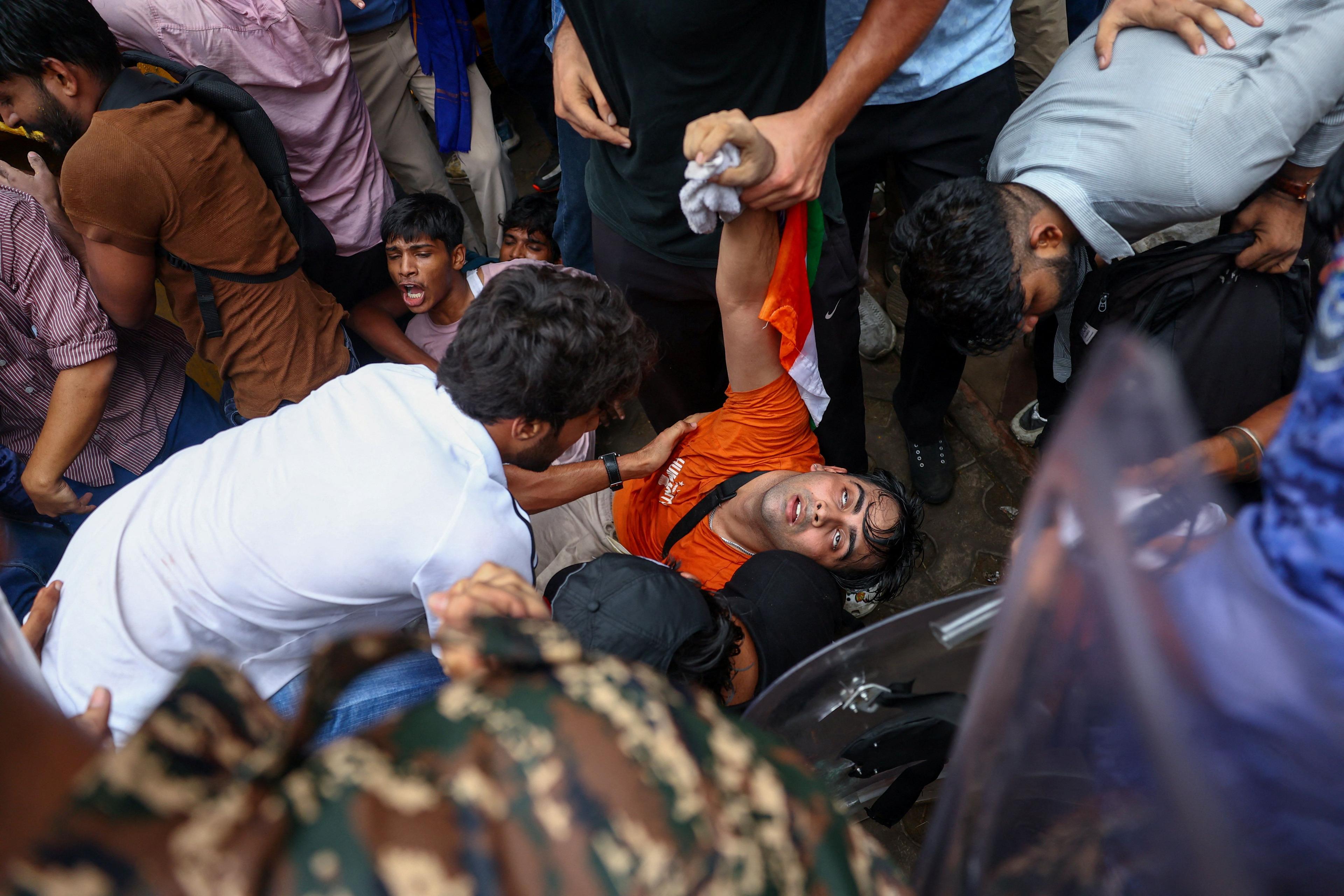 Violence Escalates as Delhi Protesters Battle Police in 'Cockroach' Movement