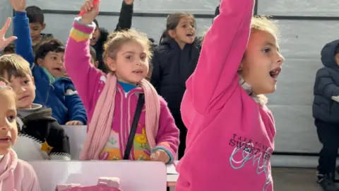 Resilient Children in Gaza Return to School Amidst Devastation