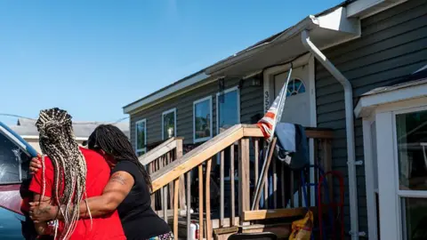 Tragic Escape: Woman and Child Jump from Roof Amid Louisiana Shooting