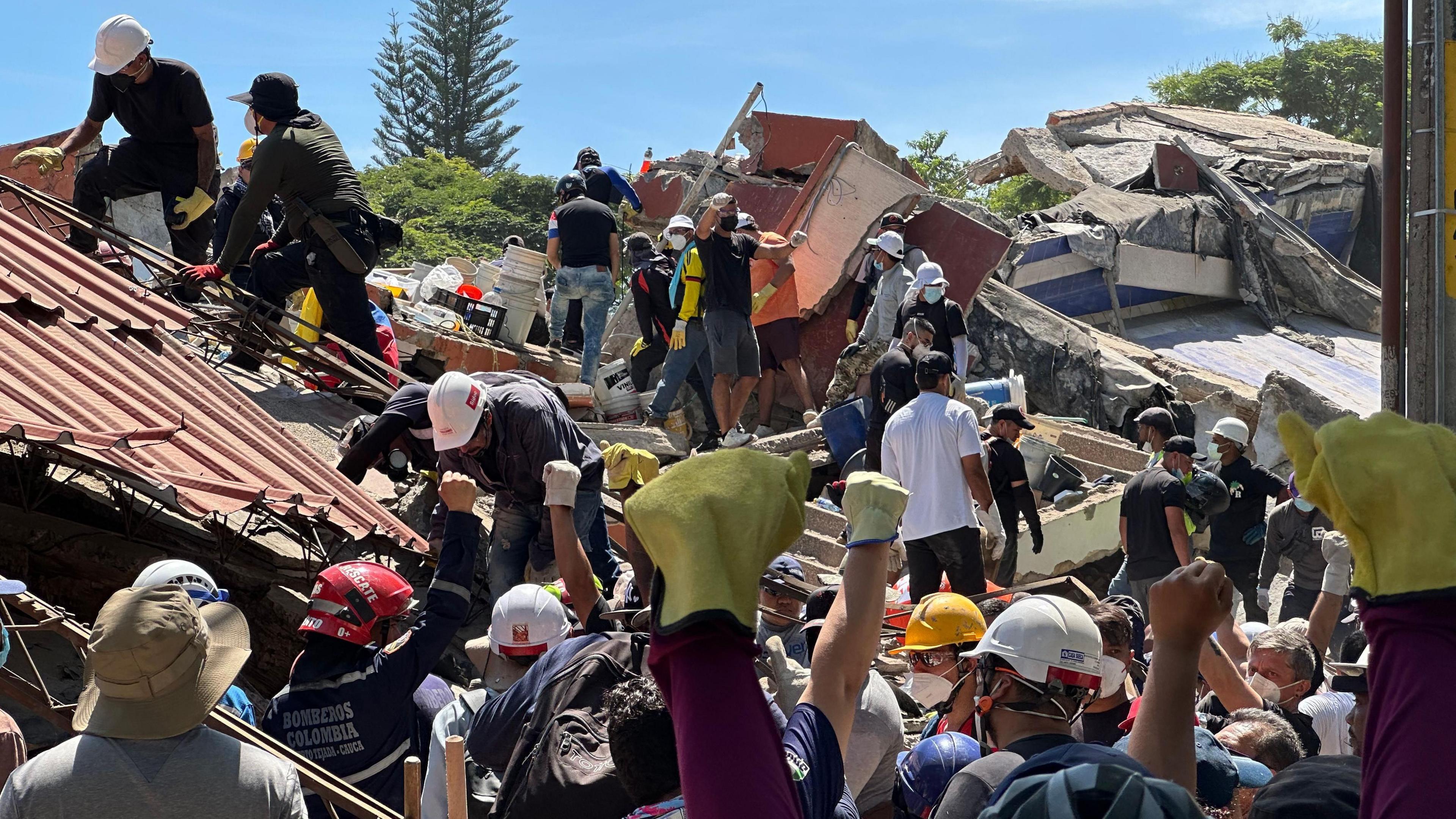 Hope Burns Amid Rubble: Colombian Brother Awaits Rescue in Cali