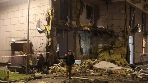 Russian Air Strikes on Kyiv Claim Lives Amid Peace Negotiations