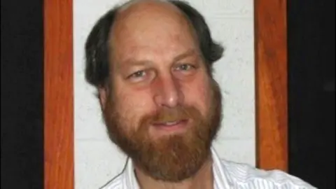 Families of Scientists Targeted by Conspiracy Theories Coping with Grief and Speculation