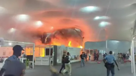 Emergency Evacuation at COP30 Climate Talks Due to Fire in Belém