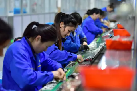 China Faces Economic Strain Amid US-Iran Conflict and Shifting Manufacturing Landscape