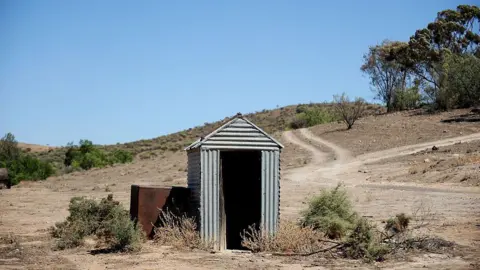Outback Toilet Mishap: Woman Rescued After Three-Hour Ordeal