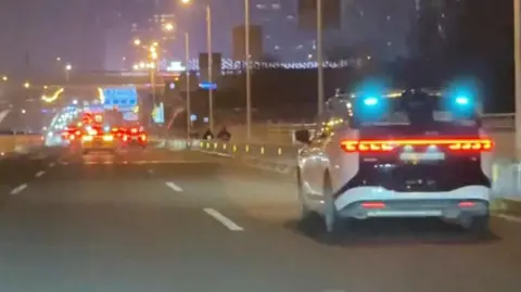 Wuhan Traffic Grind: Mass Robotaxi Malfunction Raises Safety Concerns